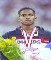 He won a number of medals in his track career. He He won a number of medals in his track career. He received two golds in World Junior Championships in 100 m and 200 m in 1992, gold in 100 m at Common